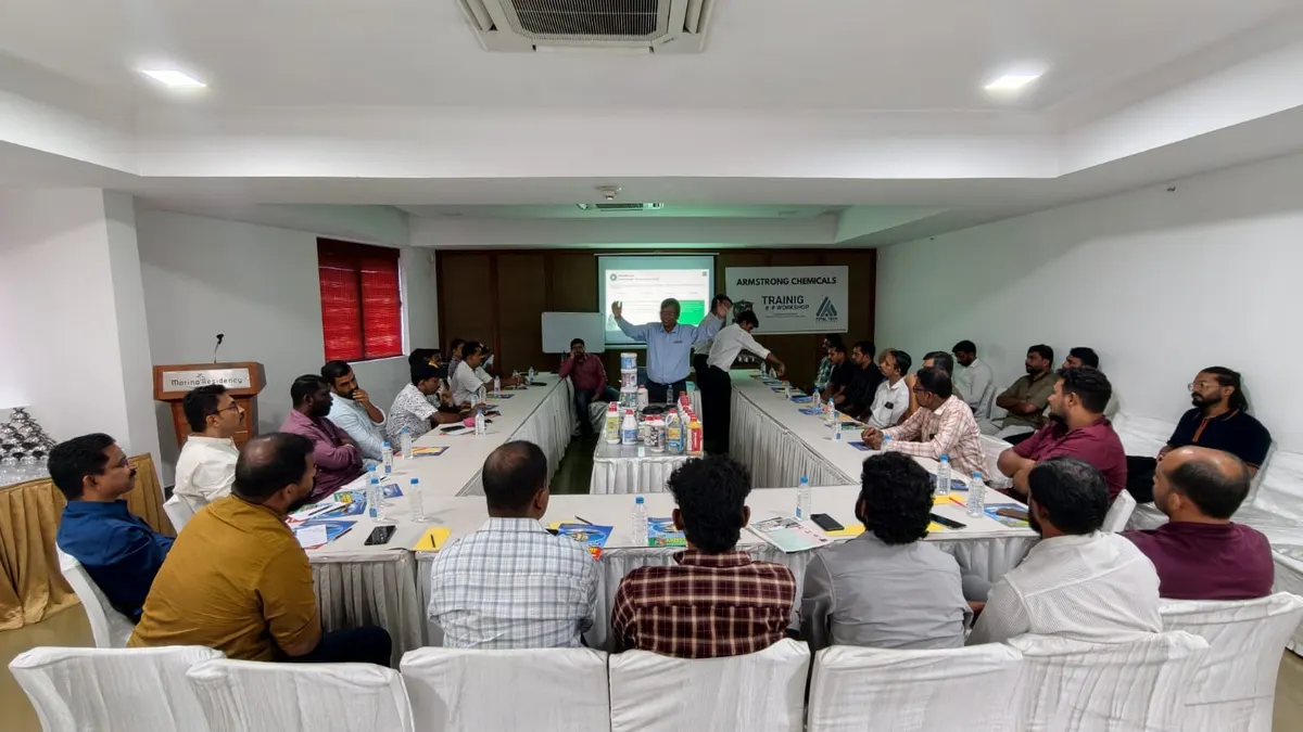 Kerala distributors and applicators seated around the conference room at the Armstrong Chemicals meet in Kozhikode